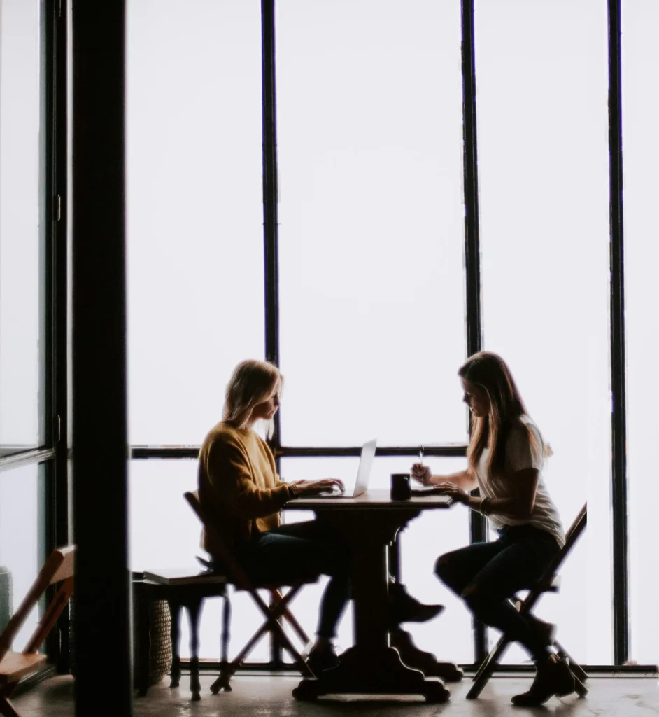 Two women working